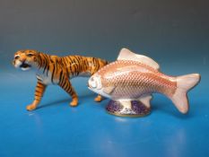 A Beswick tigress and Royal Crown Derby