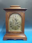 A three train bracket mantel clock with