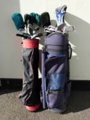 Two sets of golf clubs to include a 