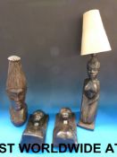 A collection of African carvings includi