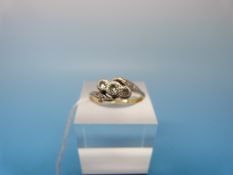 A yellow metal ring marked 18ct and plat