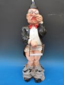 A comical toilet roll holder