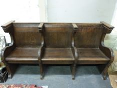 An unusual oak church pew from Winchcomb