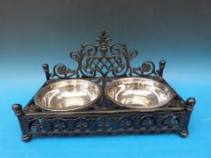 A large ornate dog feeding station with
