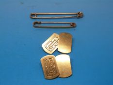 A pair of 9ct gold cuff links together w
