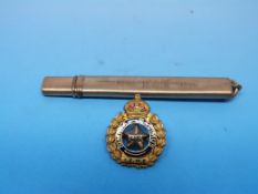 A hallmarked 9ct gold pencil holder engr