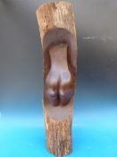 A large mahogany sculpture of a ladies b
