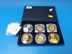 Six 50mm Portraits of The Queen coins in