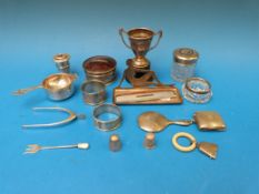 An hallmarked silver trophy cup, napkin