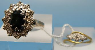A hallmarked 9ct gold ring set with a sa