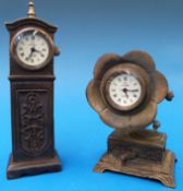 Two Omega miniature bronze novelty clock