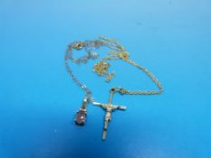 A yellow metal pendant on a yellow metal