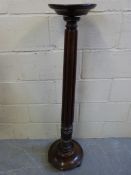 A 19thC mahogany jardiniere stand or tor