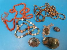 A coral necklace and bracelet, hardstone