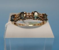 A 14ct gold ring set with Alexandrite an