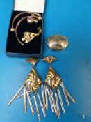 A silver box, silver necklace and pendan