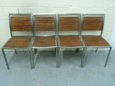 A set of four stainless steel and teak g
