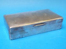 A hallmarked silver cigarette box (Ldn),