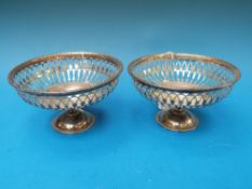 A pair of Edwardian pierced silver pedes
