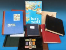 A crate of stamp albums, stockbooks and