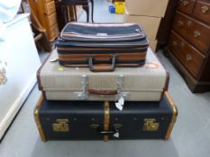 A vintage steamer trunk and two other it