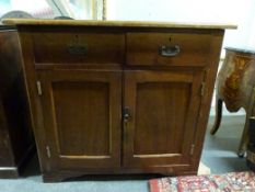 A 19th century cupboard fitted two drawe