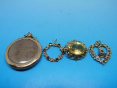 A hallmarked 9ct gold pendant, a hallmar