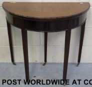 A 19thC mahogany fold over D shaped card