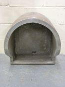 An aluminium retro phone booth marked Bu