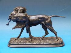 A cast bronze of a hunting hound with a