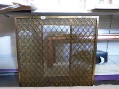 A copper and brass fire kerb, copper fire kerb and a fire guard