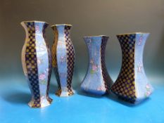 Two pairs of blue and gilt Wedgwood vase
