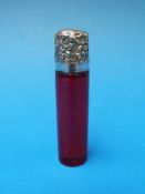 A hallmarked silver mounted cranberry gl