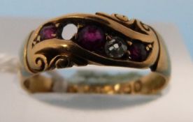 A hallmarked 18ct gold ring set with rub