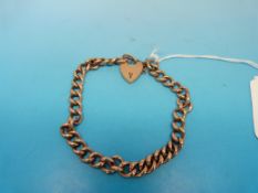 A yellow metal bracelet marked 9ct gold