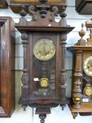 A Vienna style wall clock with two train