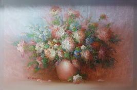 Oil on canvas still life of flowers in a