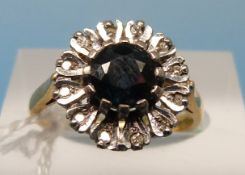 An 18ct gold ring set with a central sap