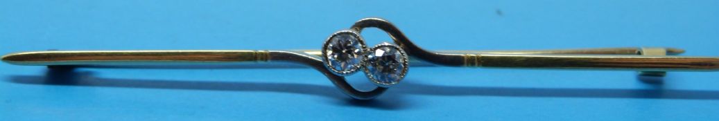 A yellow metal brooch marked 530 set wit