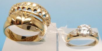 Two 9ct gold rings, one depicting a wate