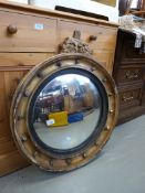 A Regency convex mirrow with ball detail