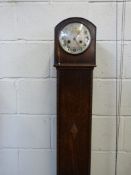 An oak cased two train granddaughter clo