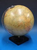 A Philips 10in Challenge Globe on base,