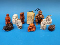 A collection of netsukes and similar ite