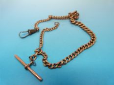 A yellow metal Albert chain with graduat