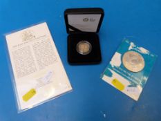 A 2009 silver proof cased £1 coin, toget