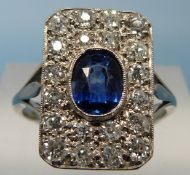 A platinum ring set with an oval sapphir