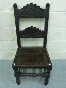An antique oak peg jointed chair with th