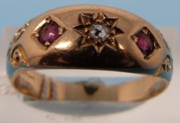 An 18ct gold ring set with a central rub