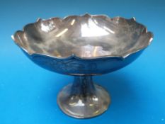 A Chinese white metal pedestal bowl with